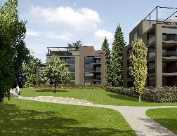 Flanierwege und alte Parkb&auml;ume pr&auml;gen die Umgebung.