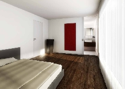 Grossz&uuml;gige Schlafzimmer mit direktem Zugang zum Bad.